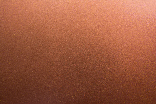 Fondo de textura de bronce pálido oscuro. Textura de cobre photo