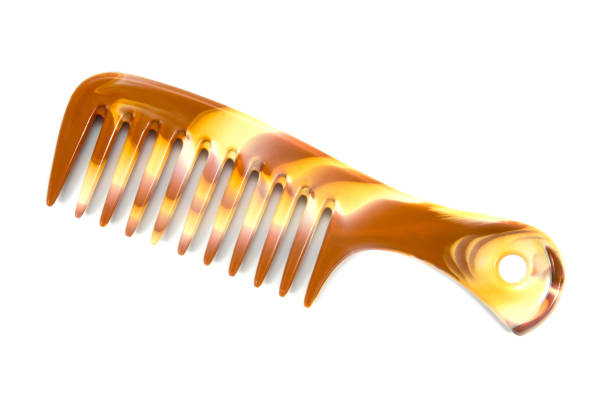 istock Large hair comb with hole handle isolated on white background. 1050746304