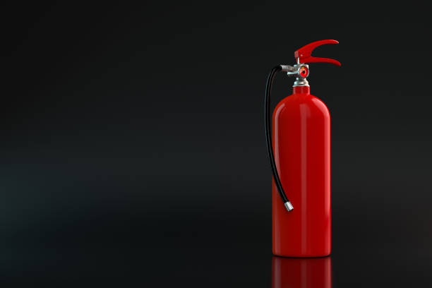 3d rendering fire extinguisher isolated on black background 3d rendering fire extinguisher isolated on black background flammable photos stock pictures, royalty-free photos & images