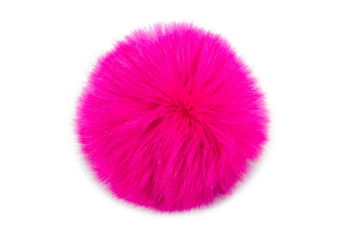Pink fur ball isolated on white background