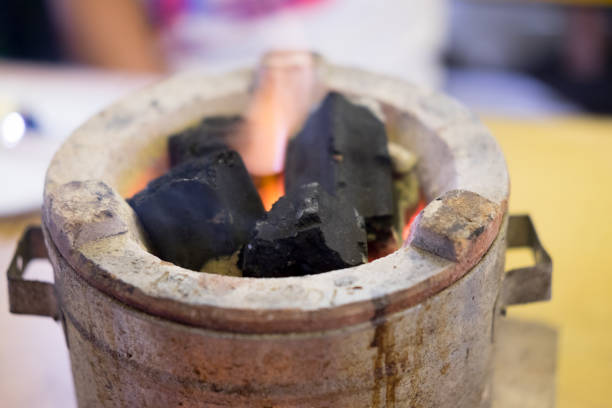 istock Burning charcoal firewood in the stove, selective focus 1050761132