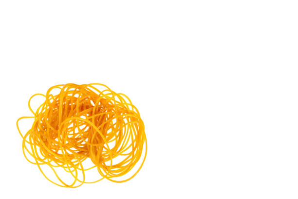 istock Yellow rubber bands close up isolated on white background, copy space template. 1050768660