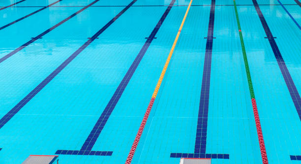 istock Empty blue swimming pool, background photo 1050768904