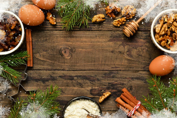 istock Christmas card with decorations on a wooden background. Christmas baking, cooking process. 1050778734