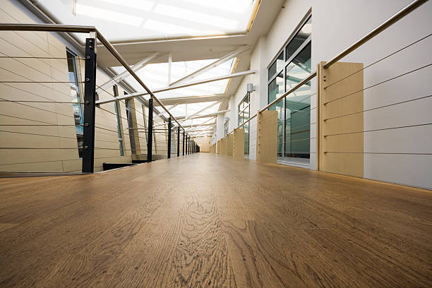 Low angle view of corridor in office building stock photo