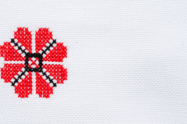 istock Element Handmade Embroidery on White Linen by Red and Black Cotton Threads. 1050791808