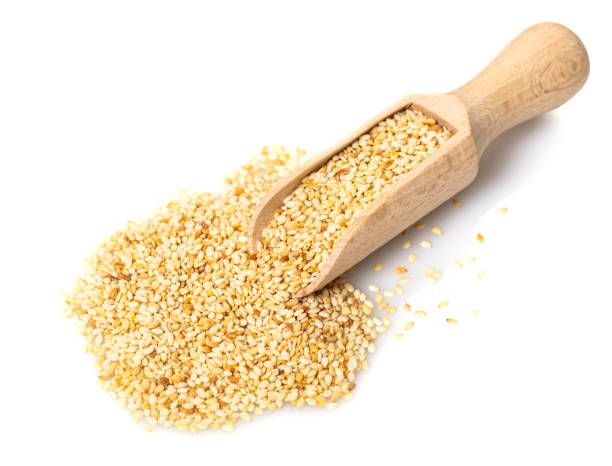 istock sesame seeds in a wooden scoop 1050793650