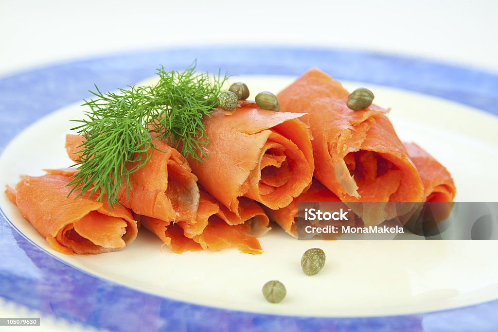 Smoked salmon, lox Smoked salmon, lox, with dill and capers Appetizer Stock Photo