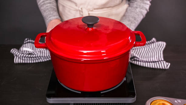 istock Cooking turkey chili in enameled cast iron covered dutch oven. 1050799678
