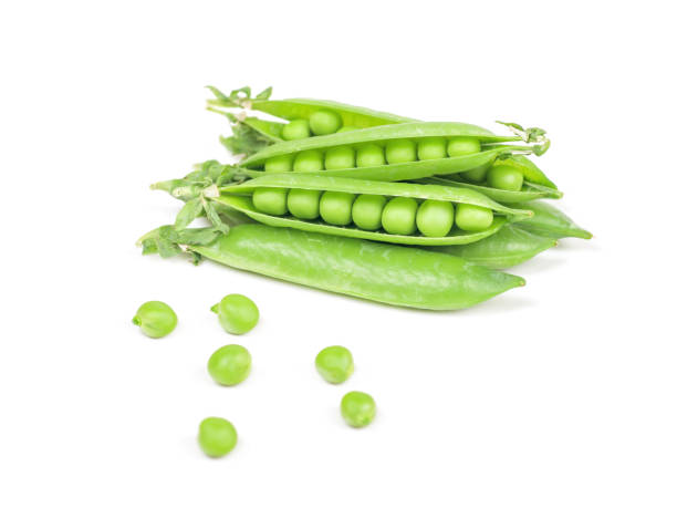 istock green peas isolated on white background 1050806576