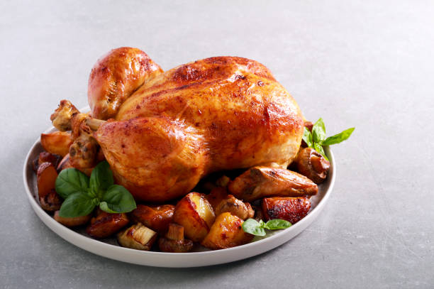 istock Roast chicken with roast potatoes and mushrooms 1050813318