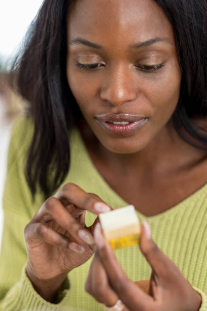 istock Young black woman at lunch 1050814476
