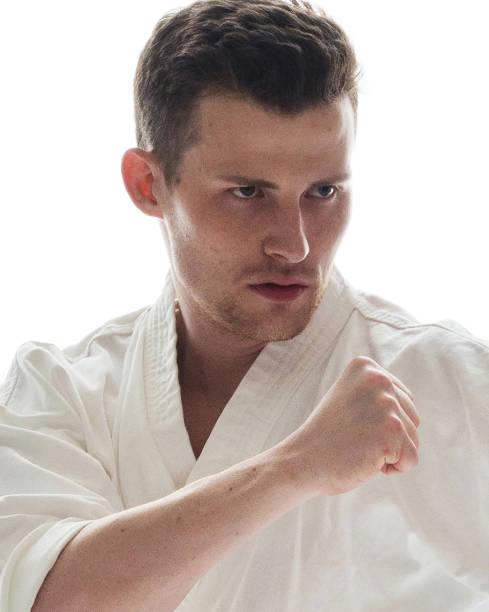 istock Attractive man in karate clothes 1050825526