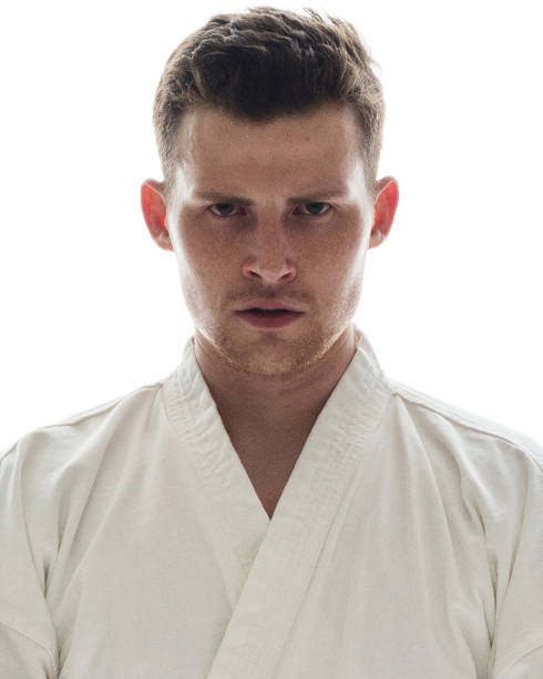 istock Attractive man in karate clothes 1050825530