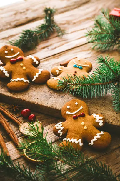 Christmas food. Gingerbread Man cookies in Christmas setting. Xmas dessert. Christmas Table