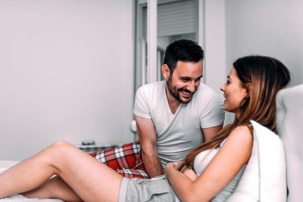 istock Loving couple in bed. 1050827898