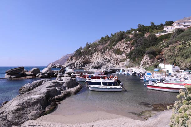 The port of Manganitis on Ikaria island, Greece Little port, Greece, Greek Islands, Ikaria Island, Seychelles Beach, Manganitis,Dodecanese Islands ikaria island stock pictures, royalty-free photos & images