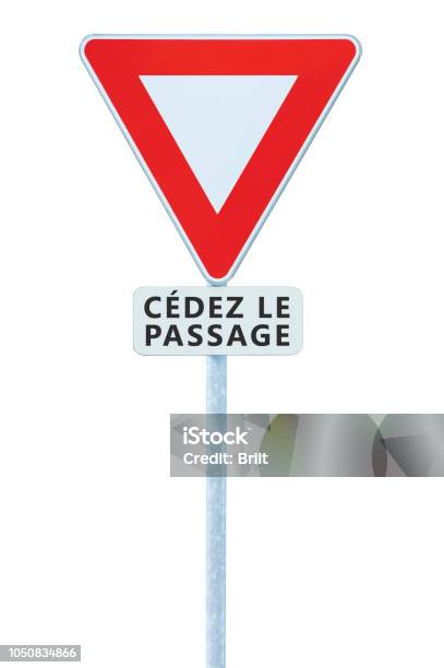 Give Way Yield French Cédez Le Passage Road Sign France Isolated Vertical Macro Closeup White Signage Triangle Red Frame Regulatory Warning Metallic Pole Post Panneau Signalisation Cédezlepassage Large Vehicle Traffic Priority Roadsign Signpost C Stock Photo - Download Image Now