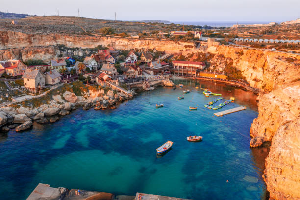 Anchor Bay, Drone Aerial Photo - Malta An aerial photo taken using a Drone in Malta of . Toning has been applied to this image malta stock pictures, royalty-free photos & images