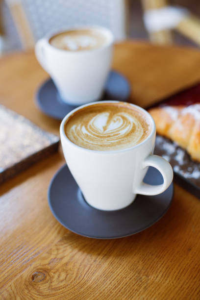 istock Two cups of cappucino. 1050839266