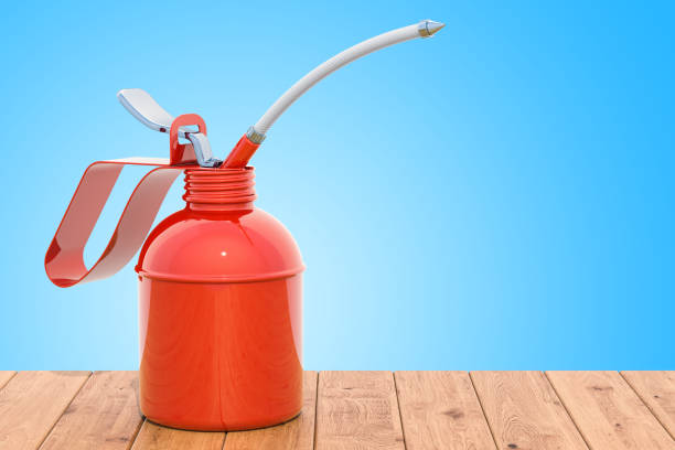 istock Red Oil Can on the wooden table. 3D rendering 1050839384