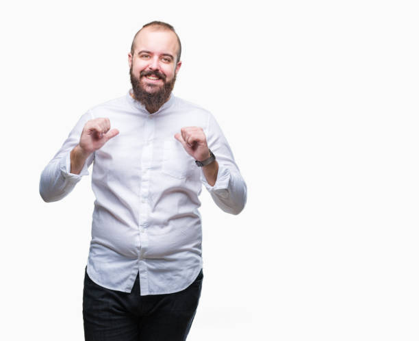 istock Young caucasian hipster man over isolated background looking confident with smile on face, pointing oneself with fingers proud and happy. 1050839478