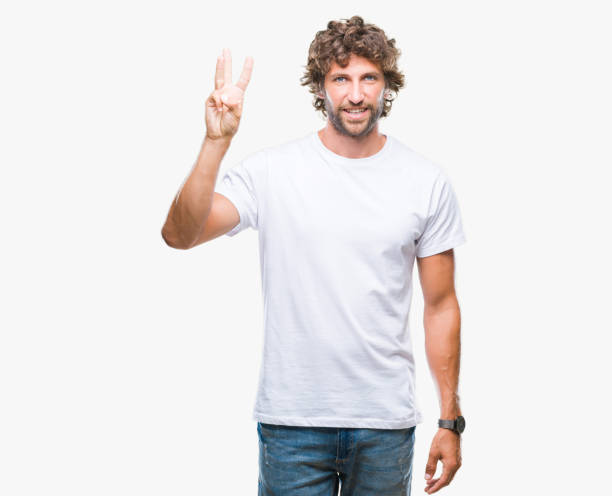istock Handsome hispanic model man over isolated background showing and pointing up with fingers number three while smiling confident and happy. 1050839926