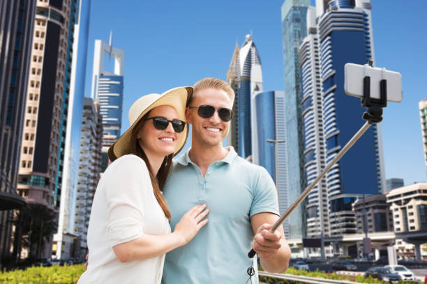 istock Couple Taking Selfie With Mobile Phone 1050851148