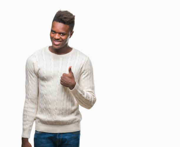 istock Young african american man over isolated background doing happy thumbs up gesture with hand. Approving expression looking at the camera with showing success. 1050852004