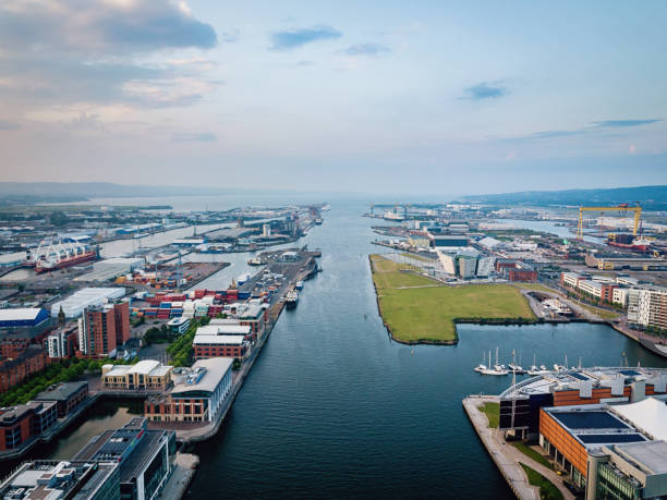 Belfast River Lagan Aerial View North Ireland Aerial view over the City of Belfast Harbour along the River Lagan with Sailertown and Titanic Quarter and Titanic Belfast. Belfast, North Ireland, UK belfast photos stock pictures, royalty-free photos & images