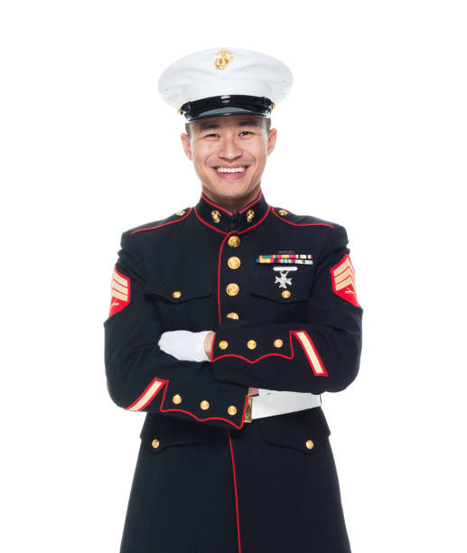 istock US Marine in uniform with arms crossed 1050858918
