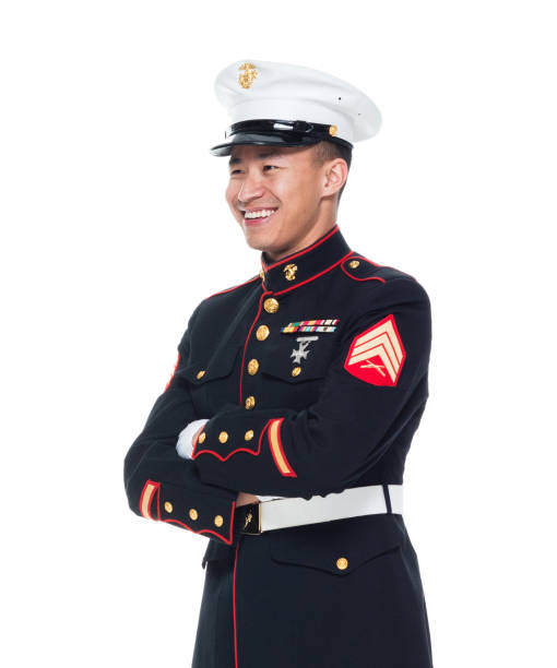 istock US Marine in uniform with arms crossed 1050858930