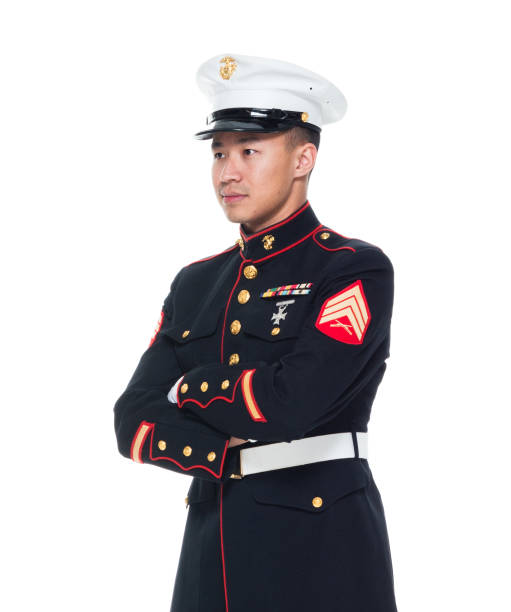 istock US Marine in uniform with arms crossed 1050858952