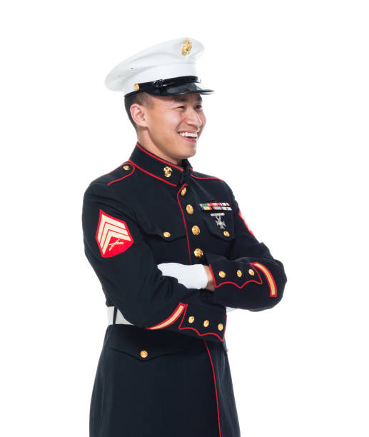 istock US Marine in uniform with arms crossed 1050858954