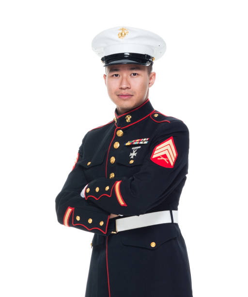istock US Marine in uniform with arms crossed 1050858960