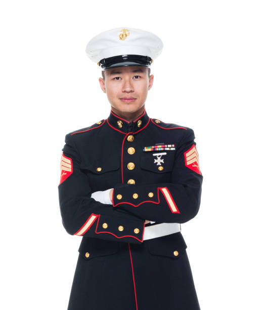 istock US Marine in uniform with arms crossed 1050858964