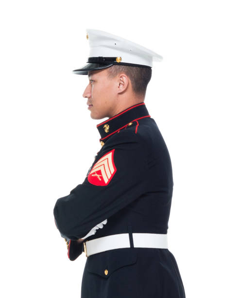 istock US Marine in uniform with arms crossed 1050858968