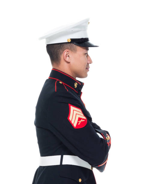 istock US Marine in uniform with arms crossed 1050858970