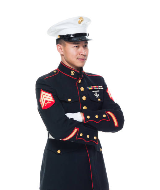 istock US Marine in uniform with arms crossed 1050858972