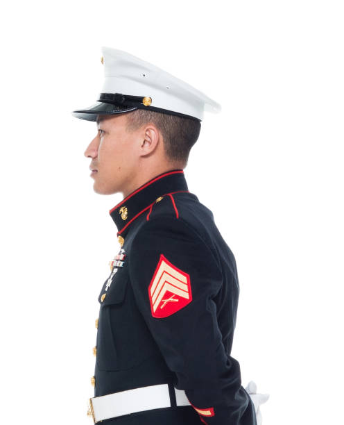 istock US Marine in uniform with arms behind 1050858978