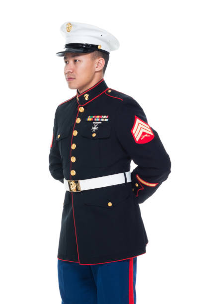 istock US Marine in uniform with arms behind 1050858982