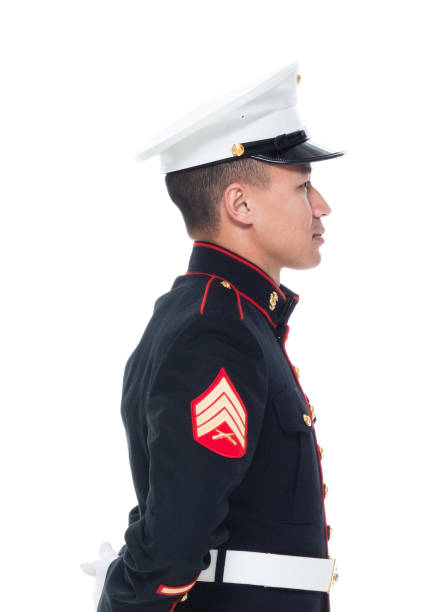 istock US Marine in uniform with arms behind 1050858994