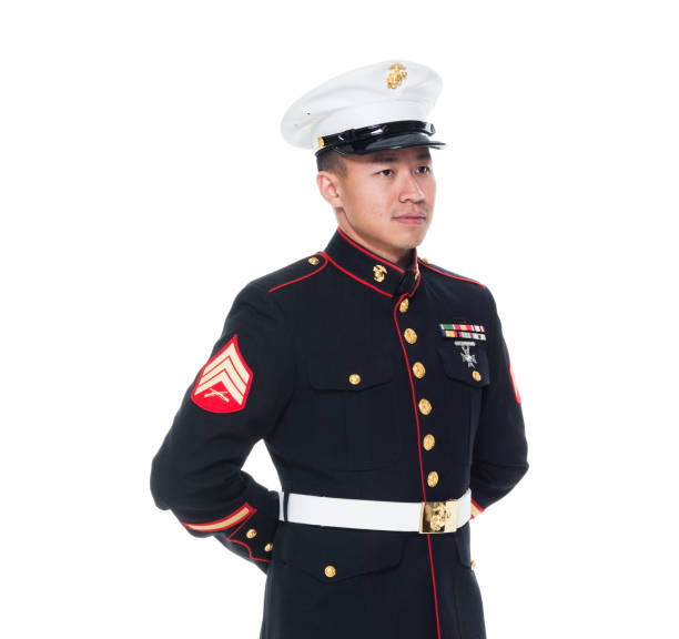 istock US Marine in uniform with arms behind 1050859004