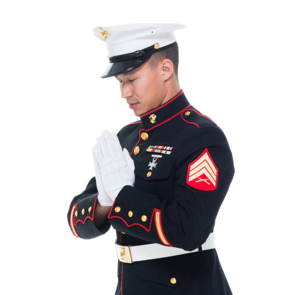 istock US Marine in uniform praying 1050859034