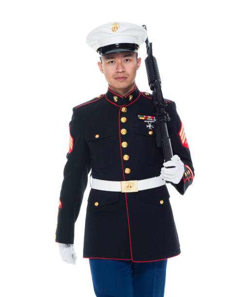 istock US Marine in uniform holding rifle 1050859092