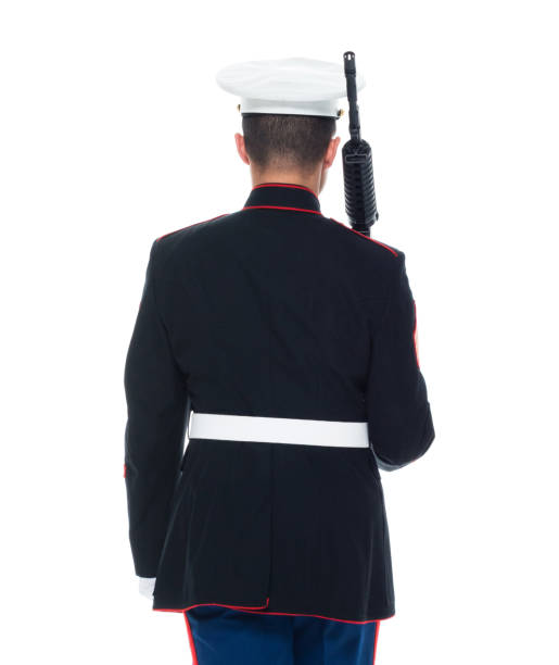 istock US Marine in uniform holding rifle 1050859276