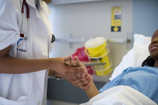 istock African doctor attends to her patient 1050859798