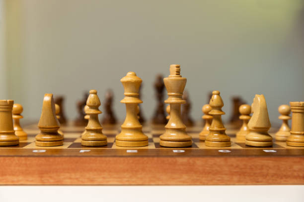 istock planning strategy with chess figures on table. Strategy, leadership and teamwork concept. 1050860472