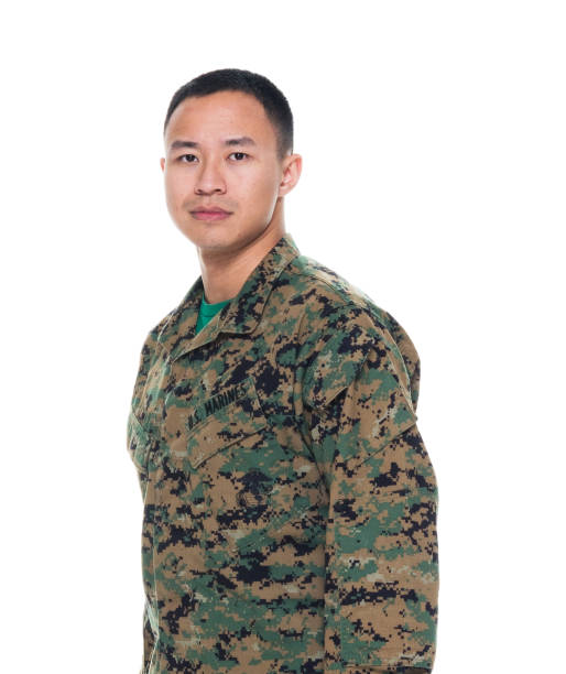 istock US Marine in uniform standing with hands by side 1050863170