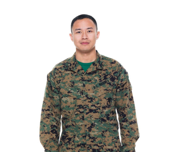 istock US Marine in uniform standing with hands by side 1050863178